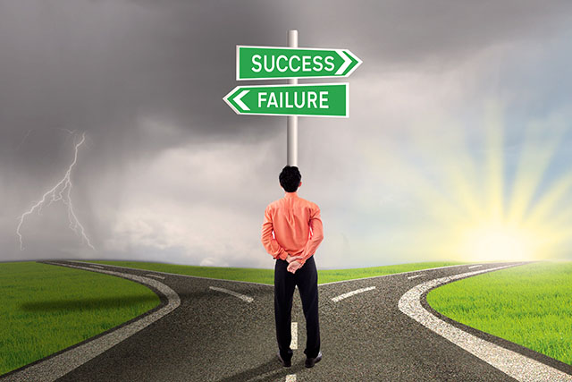 Businessman is choosing success or failure road